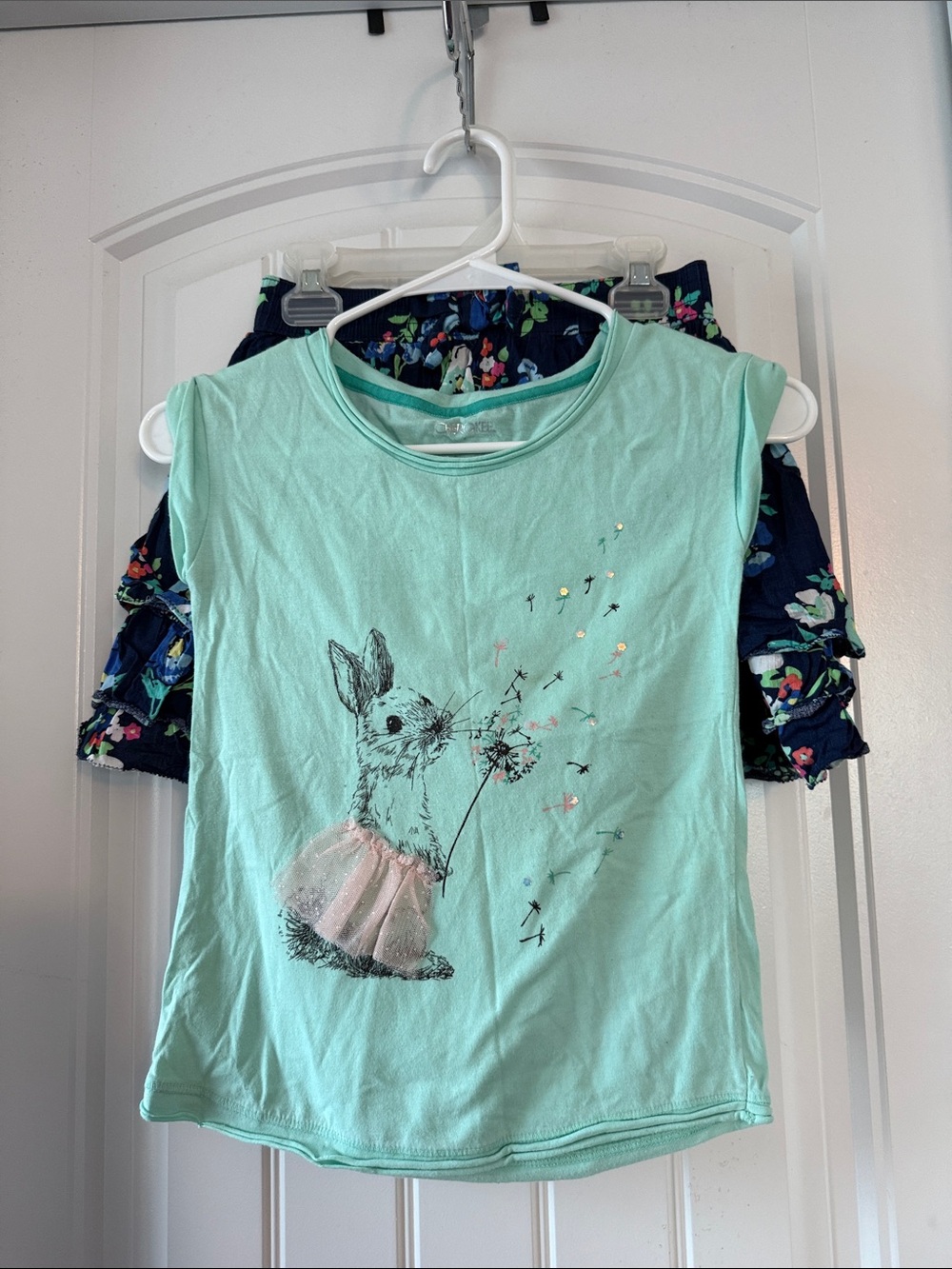 Gently worn Cherokee Mint Bunny Graphic Tee with Navy Floral Skirt Set